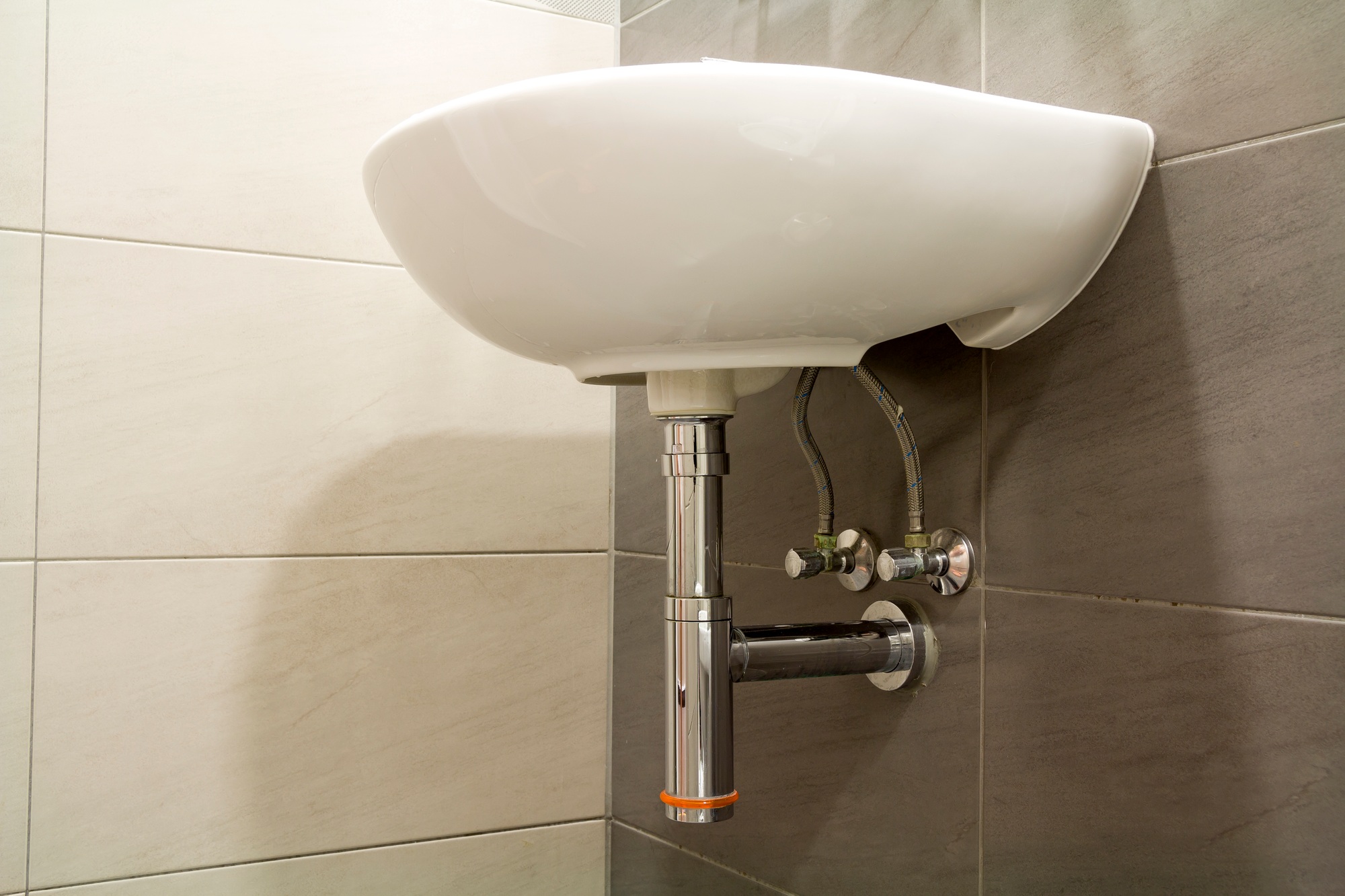 Close-up of new modern ceramic clean empty white washbasin