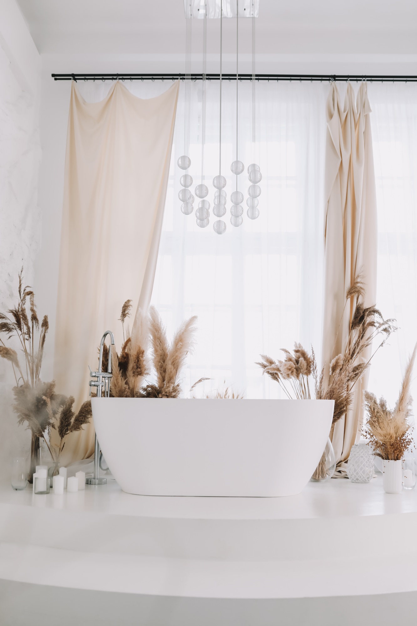 Modern white bathroom. White bath in a room with white walls. Interior design